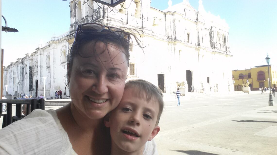 Mother and Son in front of Leon Cathedral in Nicaragua